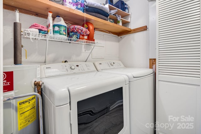 1058 Howard Gap Loop Rd, Flat Rock, NC 28731 - washroom with water heater and washer and clothes dryer