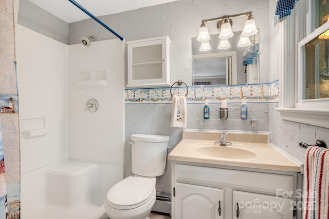 1058 Howard Gap Loop Rd, Flat Rock, NC 28731 - full bath featuring a shower, vanity, and baseboard heating