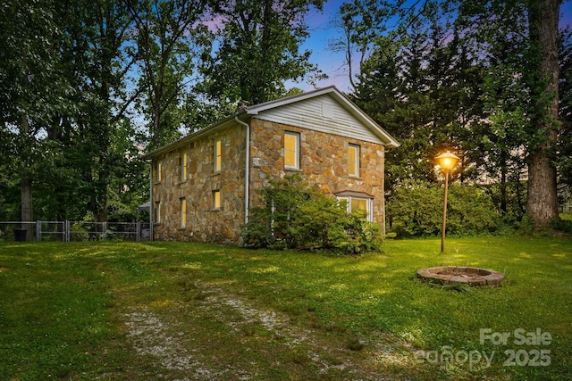 1058 Howard Gap Loop Rd, Flat Rock, NC 28731 - view of home's exterior featuring stone siding