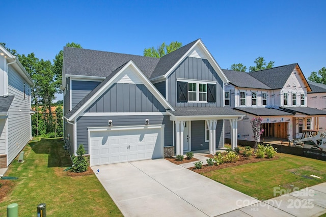 9515 Coast Laurel Ave NW, Concord, NC 28027 - view of front of property with board and batten siding, concrete driveway, a front yard, a porch, and a shingled roof