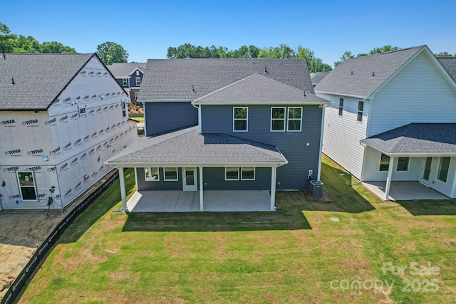 9515 Coast Laurel Ave NW, Concord, NC 28027 - rear view of house with a patio, a lawn, and roof with shingles