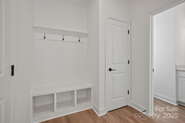 9515 Coast Laurel Ave NW, Concord, NC 28027 - mudroom featuring light wood-style flooring and baseboards