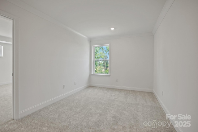 9515 Coast Laurel Ave NW, Concord, NC 28027 - empty room featuring carpet flooring, crown molding, and recessed lighting