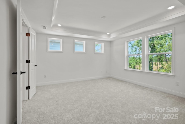 9515 Coast Laurel Ave NW, Concord, NC 28027 - carpeted spare room with a tray ceiling and recessed lighting