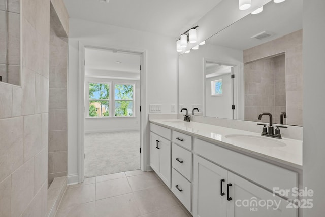 9515 Coast Laurel Ave NW, Concord, NC 28027 - bathroom with double vanity, plenty of natural light, and tile patterned flooring