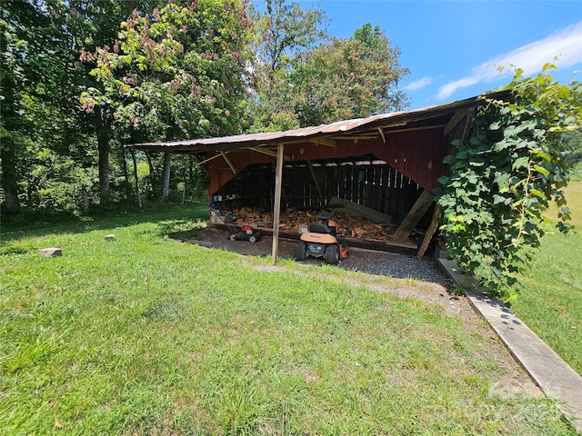 560 Bailey Mountain Rd, Mars Hill, NC 28754 - view of grassy yard with an outbuilding and a carport