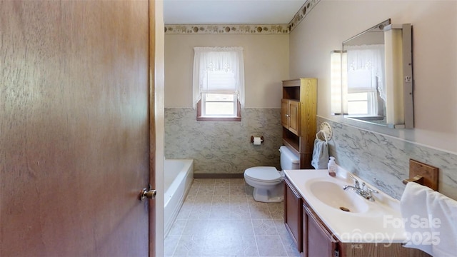 560 Bailey Mountain Rd, Mars Hill, NC 28754 - bathroom with wainscoting, a bath, and vanity