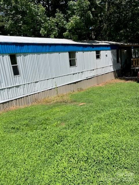 155 Calico Ln, Mooresboro, NC 28114 - view of side of property featuring a lawn