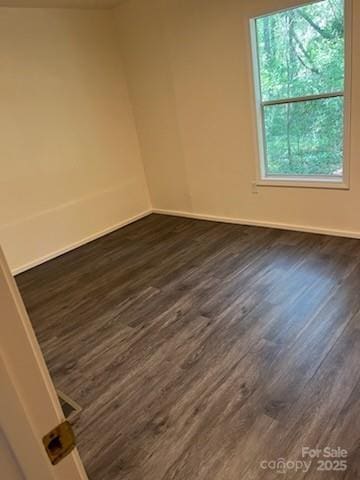 155 Calico Ln, Mooresboro, NC 28114 - unfurnished room featuring dark wood finished floors and baseboards