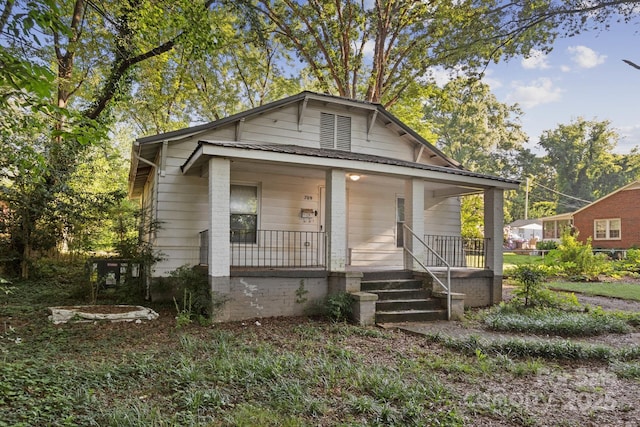 709 E Front St, Statesville, NC 28677 - bungalow-style home with a porch