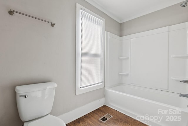 709 E Front St, Statesville, NC 28677 - full bathroom featuring wood finished floors and tub / shower combination