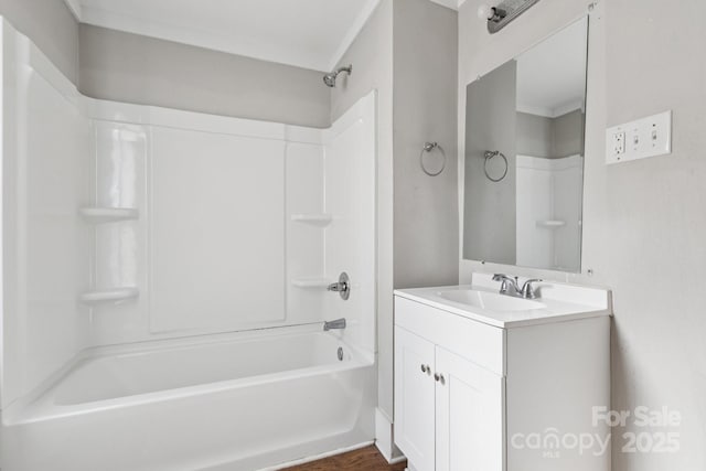 709 E Front St, Statesville, NC 28677 - bathroom with tub / shower combination, vanity, and wood finished floors