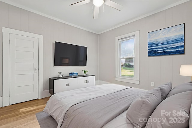 709 E Front St, Statesville, NC 28677 - bedroom featuring crown molding, light wood finished floors, and a ceiling fan
