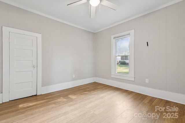 709 E Front St, Statesville, NC 28677 - spare room with crown molding, light wood-style floors, and ceiling fan