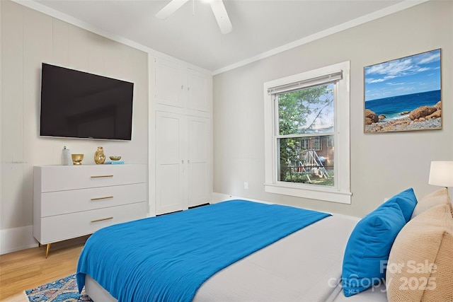 709 E Front St, Statesville, NC 28677 - bedroom featuring light wood-type flooring, crown molding, ceiling fan, and a water view