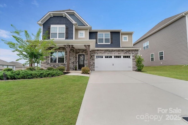 2309 Abundance Ln, Waxhaw, NC 28173 - craftsman house featuring a front yard, concrete driveway, stone siding, and an attached garage