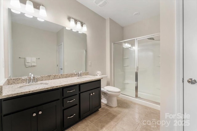 2309 Abundance Ln, Waxhaw, NC 28173 - bathroom featuring double vanity, a shower stall, and tile patterned flooring