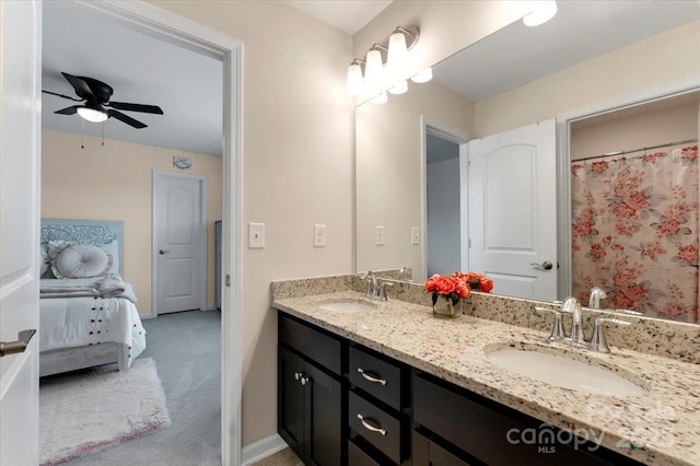 2309 Abundance Ln, Waxhaw, NC 28173 - ensuite bathroom featuring double vanity and a ceiling fan