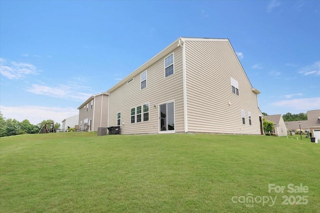 2309 Abundance Ln, Waxhaw, NC 28173 - rear view of house featuring a yard
