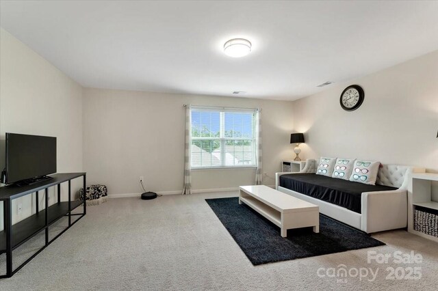 2309 Abundance Ln, Waxhaw, NC 28173 - living area featuring carpet floors and baseboards