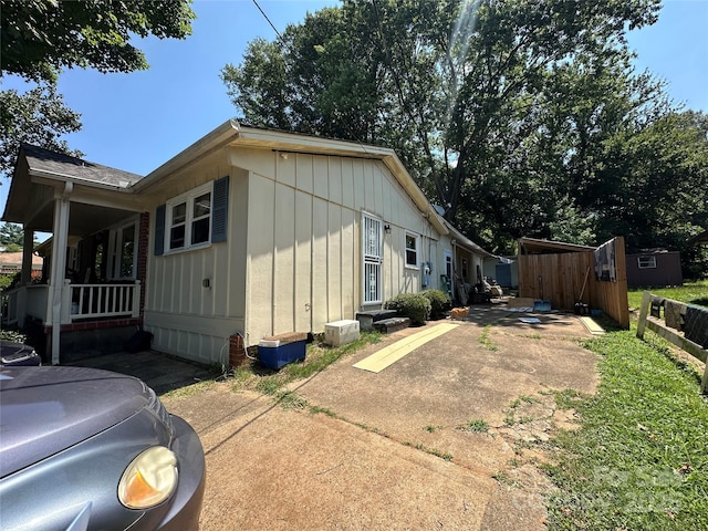 801 Tryon St, Shelby, NC 28150 - view of side of home featuring board and batten siding and covered porch