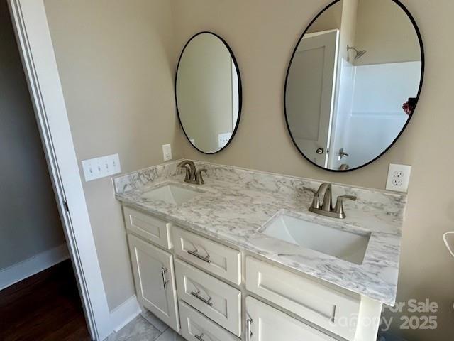 141 Maplewood Ct, Hudson, NC 28638 - full bath featuring double vanity and wood finished floors