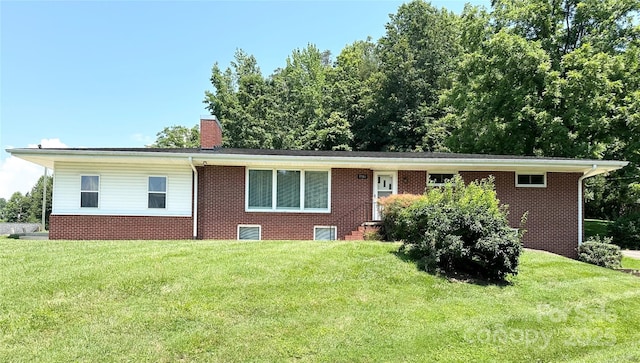 1586 Echo Dr, Lenoir, NC 28645 - ranch-style home featuring brick siding, a front yard, and a chimney