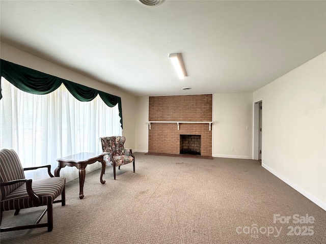 1586 Echo Dr, Lenoir, NC 28645 - sitting room with a brick fireplace and carpet flooring