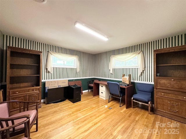 1586 Echo Dr, Lenoir, NC 28645 - office area with wallpapered walls, light wood-style floors, and plenty of natural light