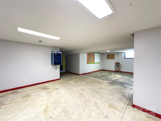 1586 Echo Dr, Lenoir, NC 28645 - below grade area featuring baseboards and light colored carpet