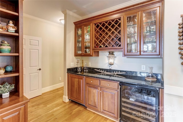 5604 Yorke St NW, Concord, NC 28027 - indoor wet bar featuring wine cooler, light wood-style floors, and ornamental molding