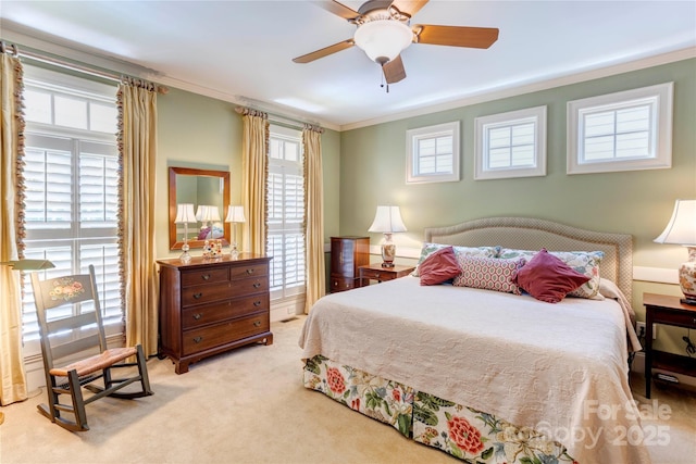 5604 Yorke St NW, Concord, NC 28027 - carpeted bedroom with multiple windows, ornamental molding, and ceiling fan
