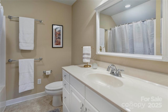 5604 Yorke St NW, Concord, NC 28027 - full bathroom with vanity and lofted ceiling