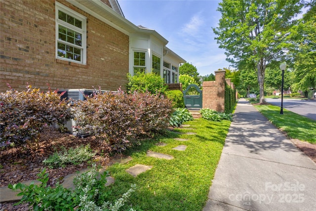 5604 Yorke St NW, Concord, NC 28027 - view of side of property with brick siding