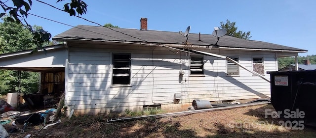 1403 Dudley Shoals Rd, Granite Falls, NC 28630 - view of side of property with crawl space and roof with shingles