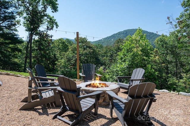 54 Weldon Way, Fairview, NC 28730 - view of yard with an outdoor fire pit, a mountain view, and a forest view