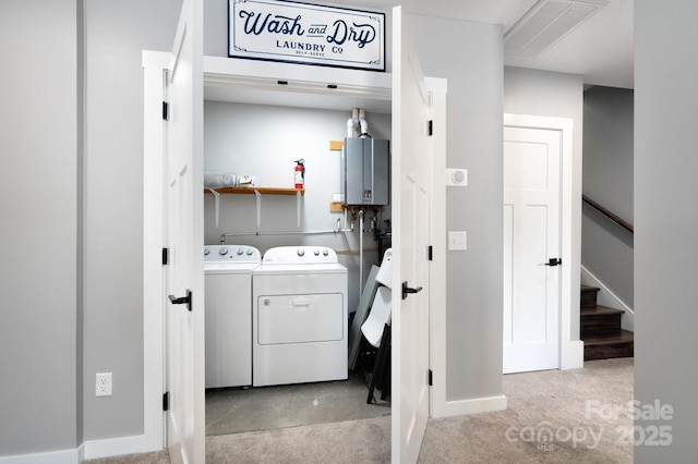 54 Weldon Way, Fairview, NC 28730 - laundry room featuring washing machine and clothes dryer and tankless water heater