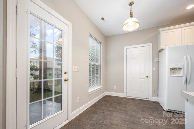 6721 Charter Hills Rd, Charlotte, NC 28277 - doorway to outside featuring dark wood-style floors and baseboards