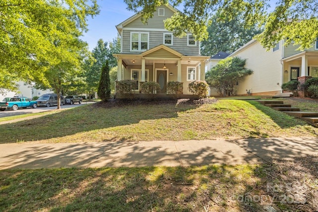 9846 Bailey Rd, Cornelius, NC 28031 - view of front facade with covered porch and a front lawn