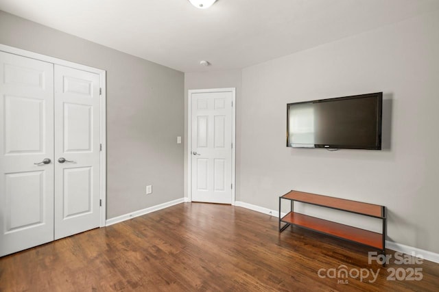 9846 Bailey Rd, Cornelius, NC 28031 - unfurnished bedroom with wood finished floors and a closet