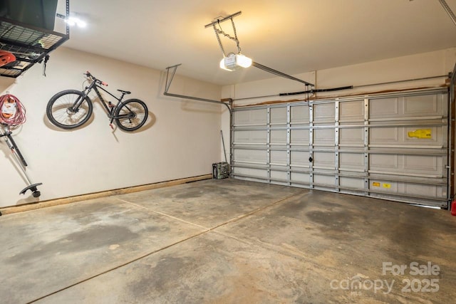 9846 Bailey Rd, Cornelius, NC 28031 - garage featuring a garage door opener