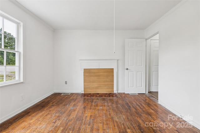 1208 Arch St E Unit 10, Lancaster, SC 29720 - unfurnished bedroom featuring crown molding, multiple windows, and hardwood / wood-style flooring