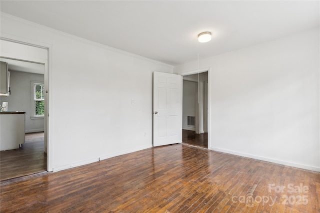 1208 Arch St E Unit 10, Lancaster, SC 29720 - empty room featuring wood finished floors and ornamental molding