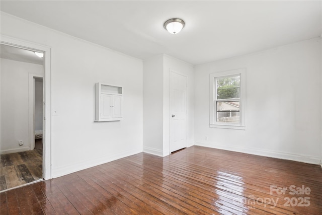 1208 Arch St E Unit 10, Lancaster, SC 29720 - unfurnished room with wood-type flooring and baseboards