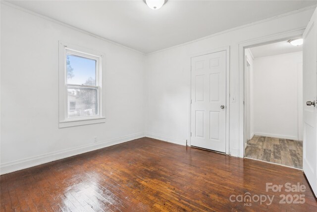 1208 Arch St E Unit 10, Lancaster, SC 29720 - unfurnished bedroom with hardwood / wood-style floors and crown molding