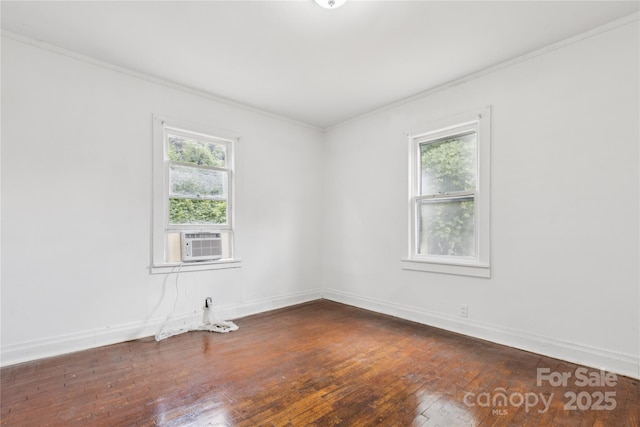 1208 Arch St E Unit 10, Lancaster, SC 29720 - empty room featuring healthy amount of natural light, crown molding, dark wood-type flooring, and cooling unit