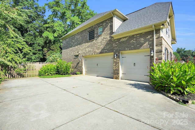 12515 Hashanli Pl, Matthews, NC 28105 - view of property exterior featuring concrete driveway, a shingled roof, a garage, and brick siding