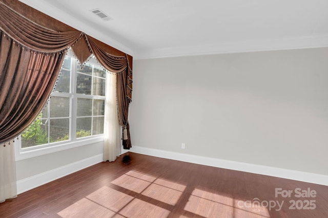 12515 Hashanli Pl, Matthews, NC 28105 - empty room with wood finished floors and crown molding