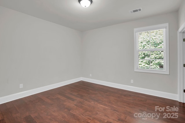 12515 Hashanli Pl, Matthews, NC 28105 - unfurnished room featuring dark wood-style flooring and baseboards