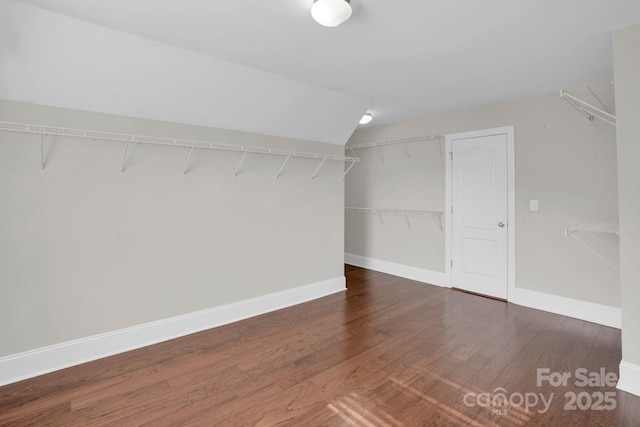 12515 Hashanli Pl, Matthews, NC 28105 - walk in closet with wood finished floors and vaulted ceiling